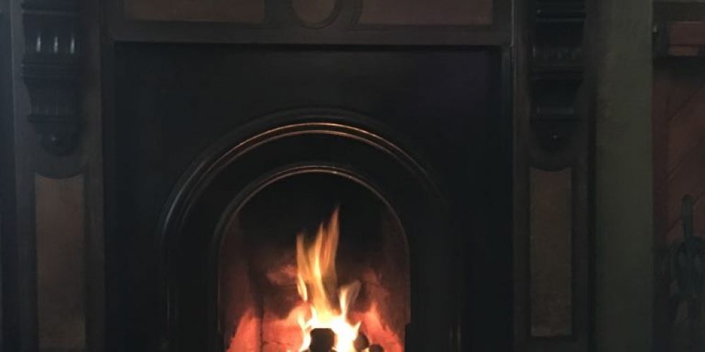 Pubs in Dublin city with a fireplace.